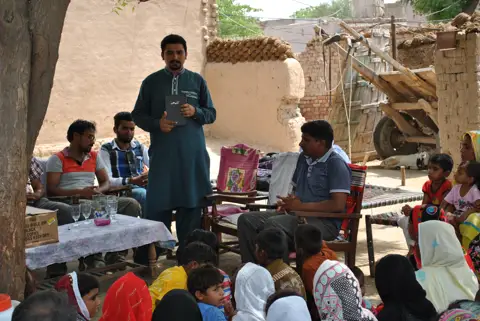 Holy Bible distribution & village fellowship