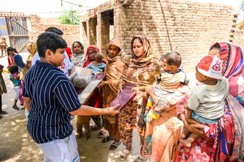 Holy Bible distribution & village fellowship