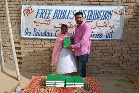 Holy Bible distribution & village fellowship