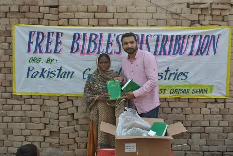 Holy Bible distribution & village fellowship